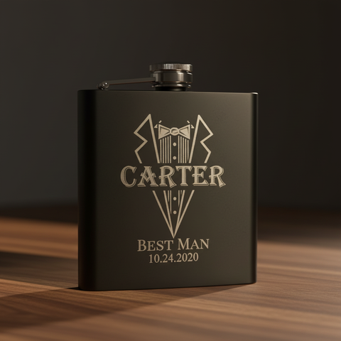 Personalized matte black tuxedo flask engraved with a groomsman's name and date, an affordable under-30 dollar groomsmen gift from Groovy Groomsmen.
