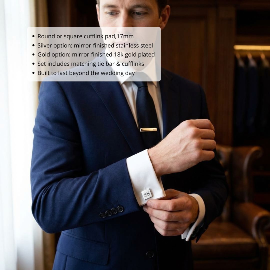 Man in navy suit wearing mirror-finished silver cufflinks and matching tie bar on white dress shirt cuff