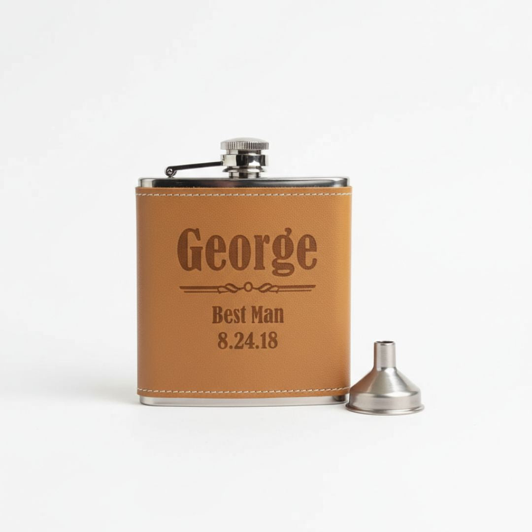 Tan leather flask with stainless steel cap and funnel, personalized with sample engraving "George," "Best Man," and date "8.24.18