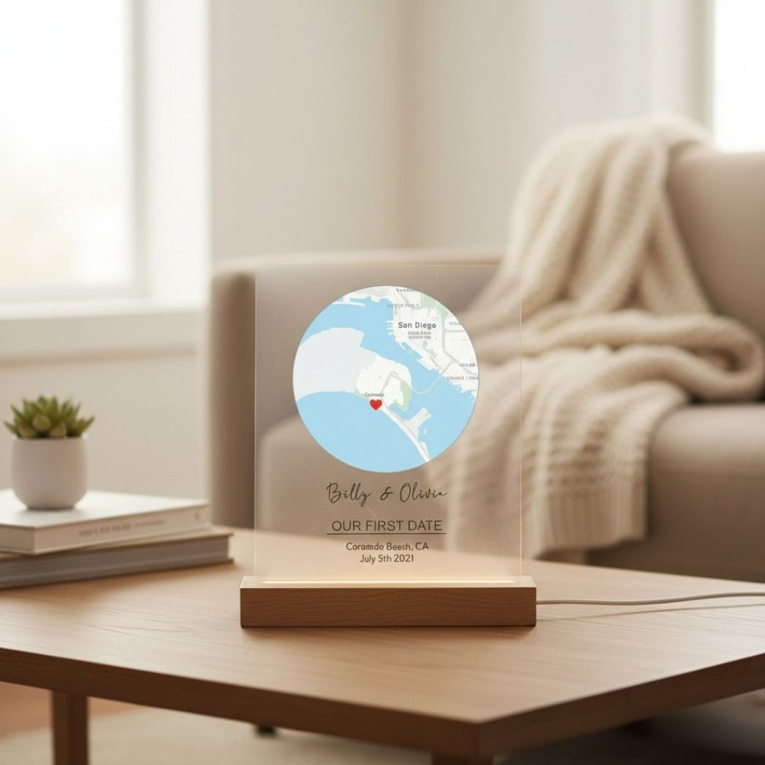 Acrylic map sign with wood base displaying San Diego coastline, red heart marker, and personalized text reading "Billy & Olivia, OUR FIRST DATE, Coronado Beach, CA, July 5th 2021