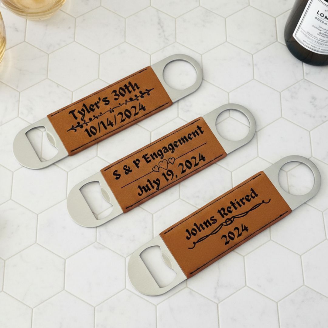 Three tan leather bottle openers with silver metal handles, each engraved with sample text including "Tyler's 30th," "S & P Engagement," and "Johns Retired," displayed on hexagonal tile background.