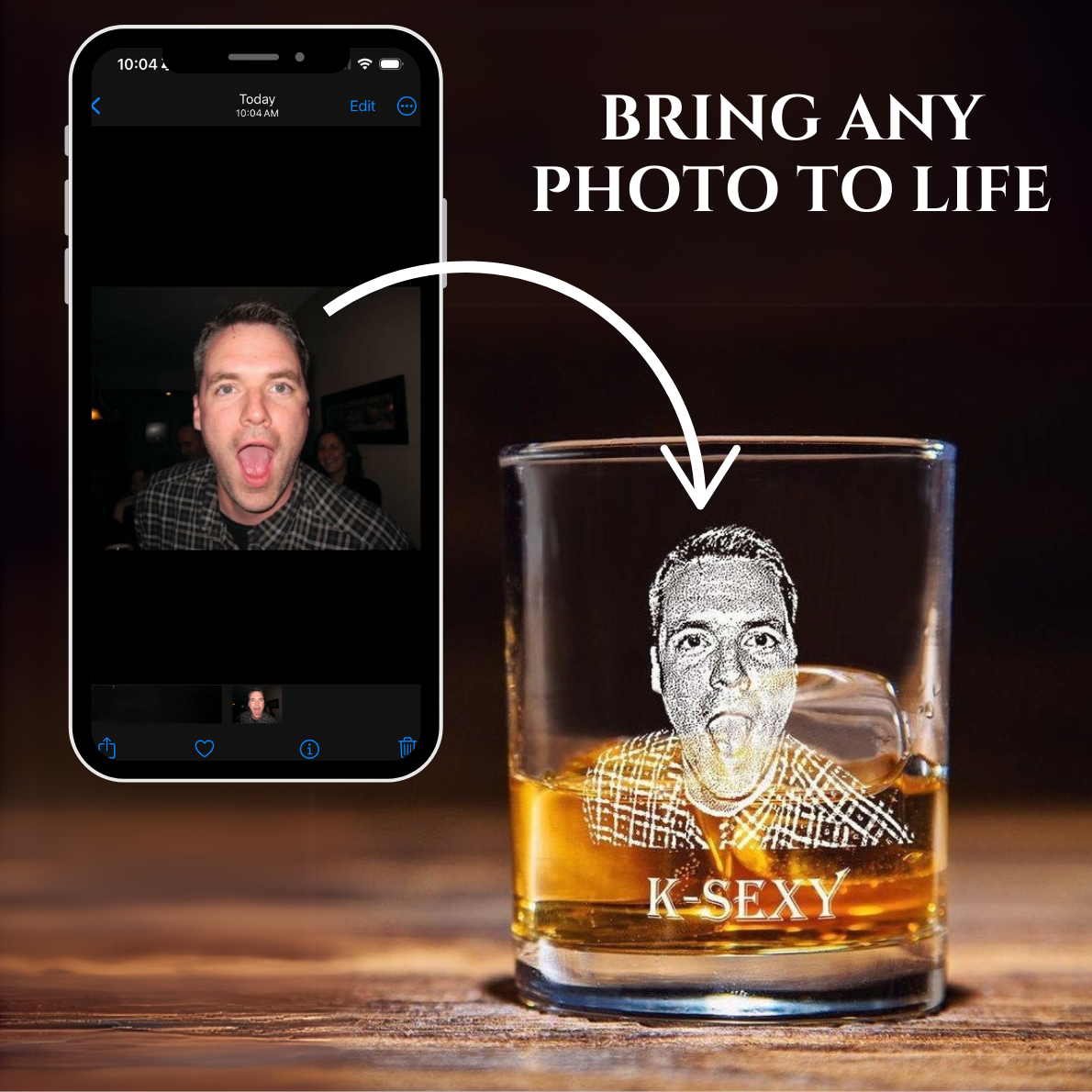 Whiskey glass filled with amber liquid, laser-engraved with sample portrait photo and text "K-SEXY" below, displayed alongside smartphone showing source image