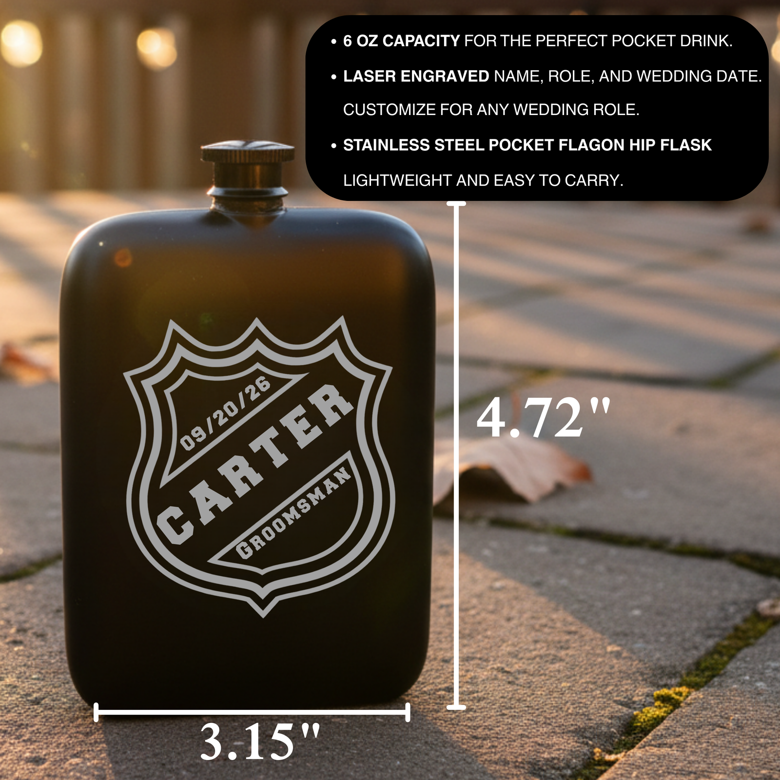 Black stainless steel flask with laser-engraved shield crest displaying sample text "Carter," "09/20/25," and "Groomsman," measuring 3.15" wide by 4.72" tall