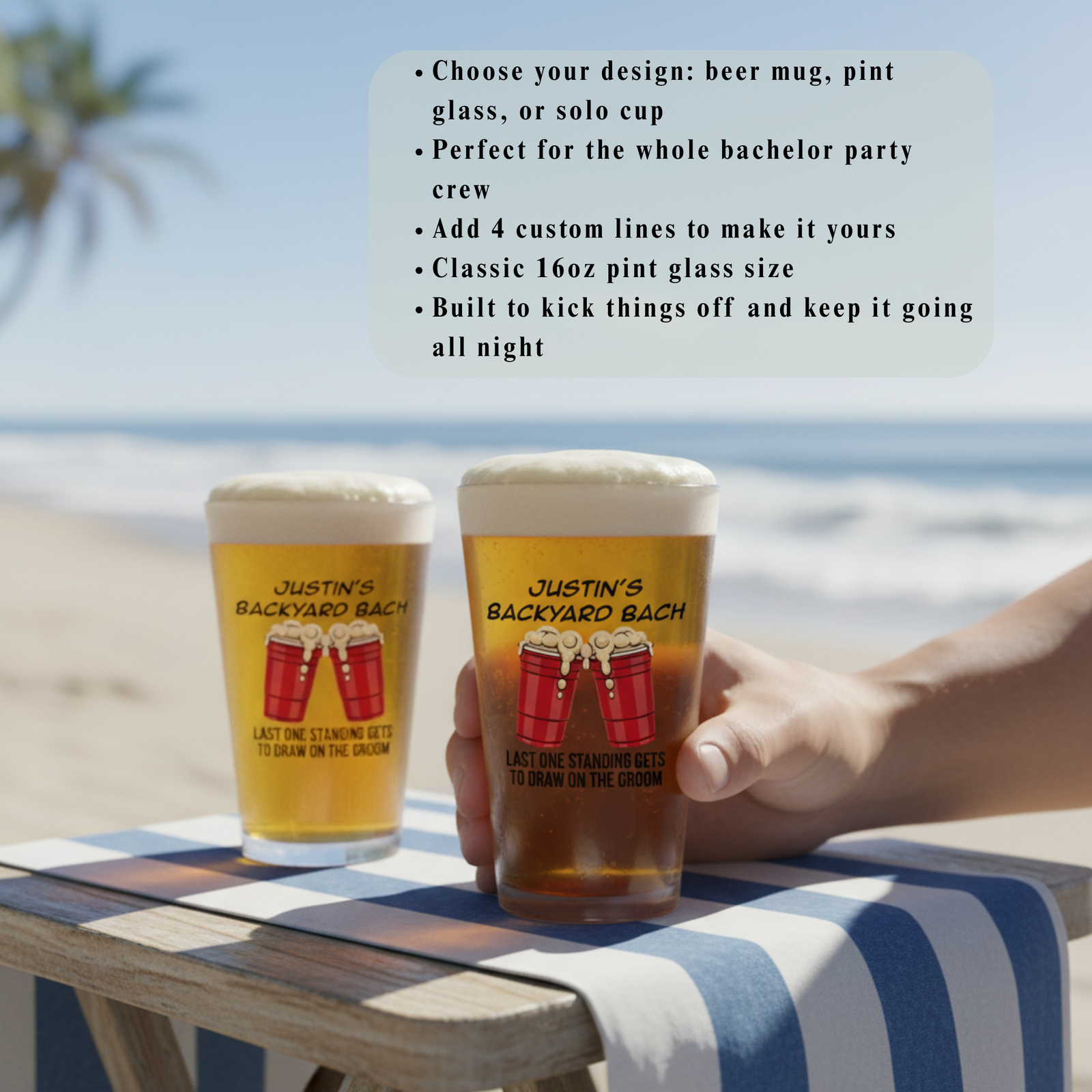 Two customized 16oz pint glasses with sample personalization reading "Justin's Backyard Bach" and red cup graphics, filled with beer on a beach towel near ocean
