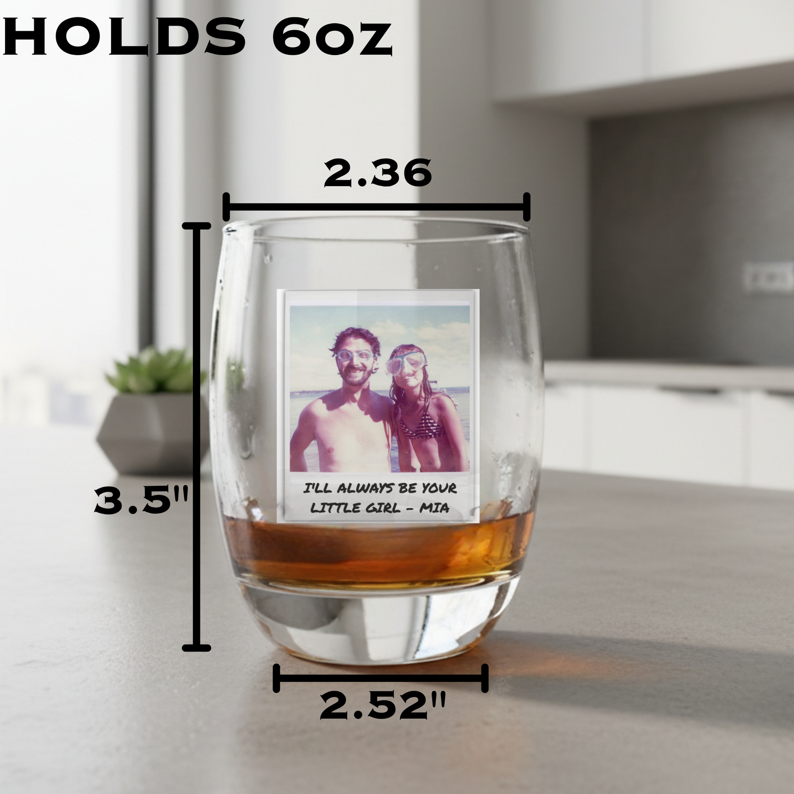 6oz whiskey glass with personalized photo print showing two people at beach with sample text "I'll always be your little girl - Mia", dimensions marked at 3.5" height and 2.36" width
