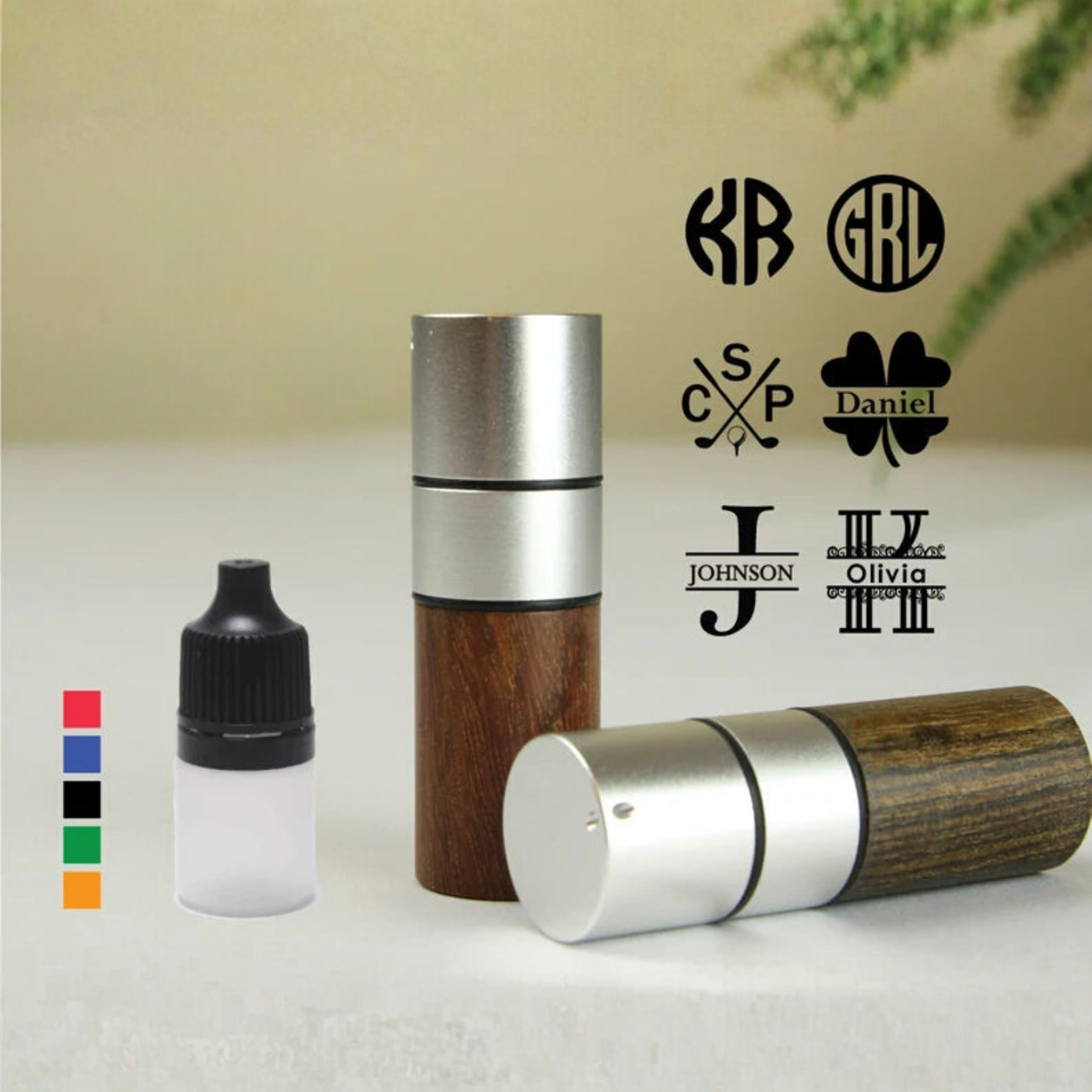 Design options grid showing six personalization styles for wooden golf ball stamp, including monogram, initials, and name variations with sample engravings, plus color swatches for stamp pad selection