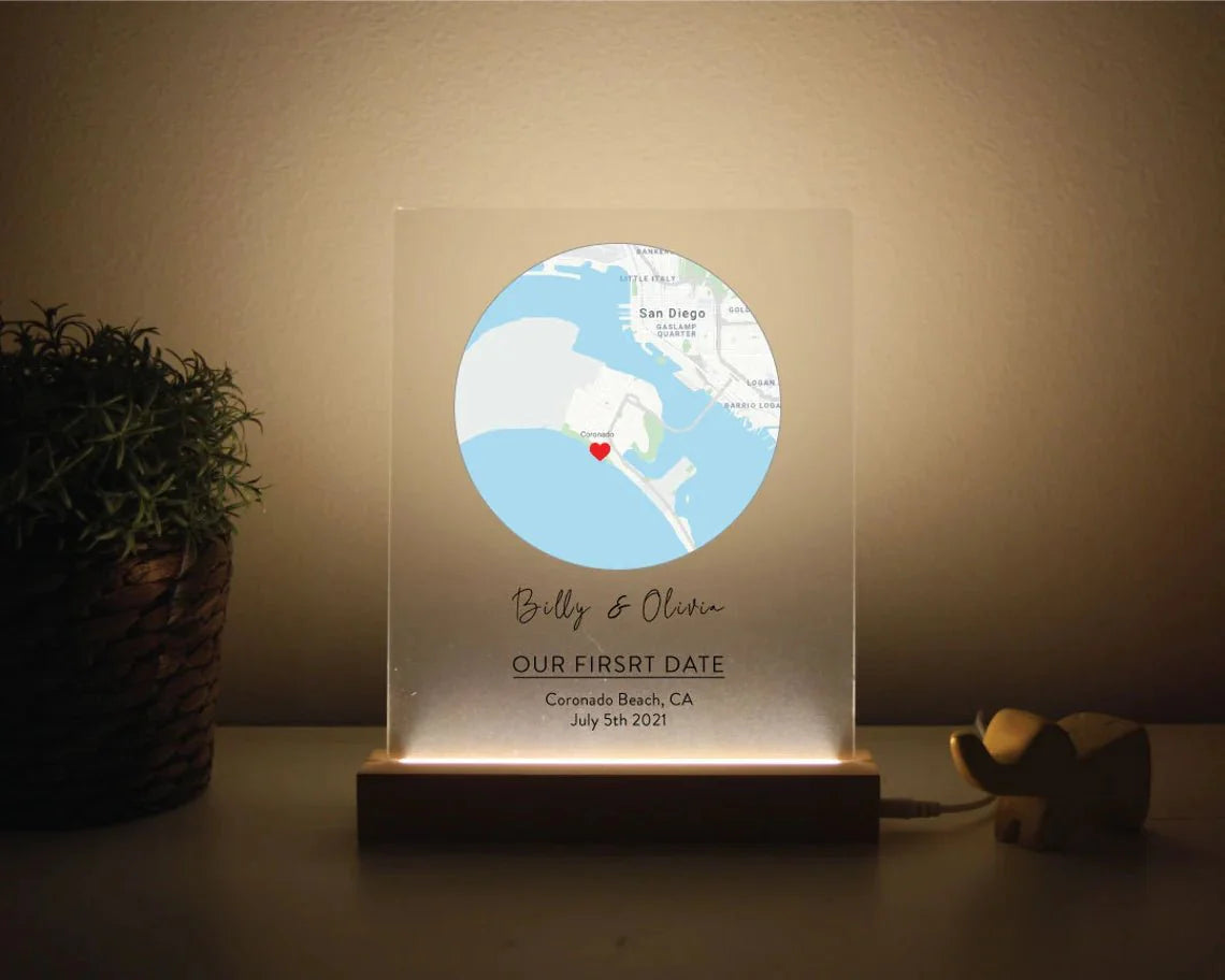 Romantic map sign personalized with custom coordinates, names, and date, available in wood or acrylic with optional LED light stand – perfect for Valentine’s Day, anniversaries, or weddings