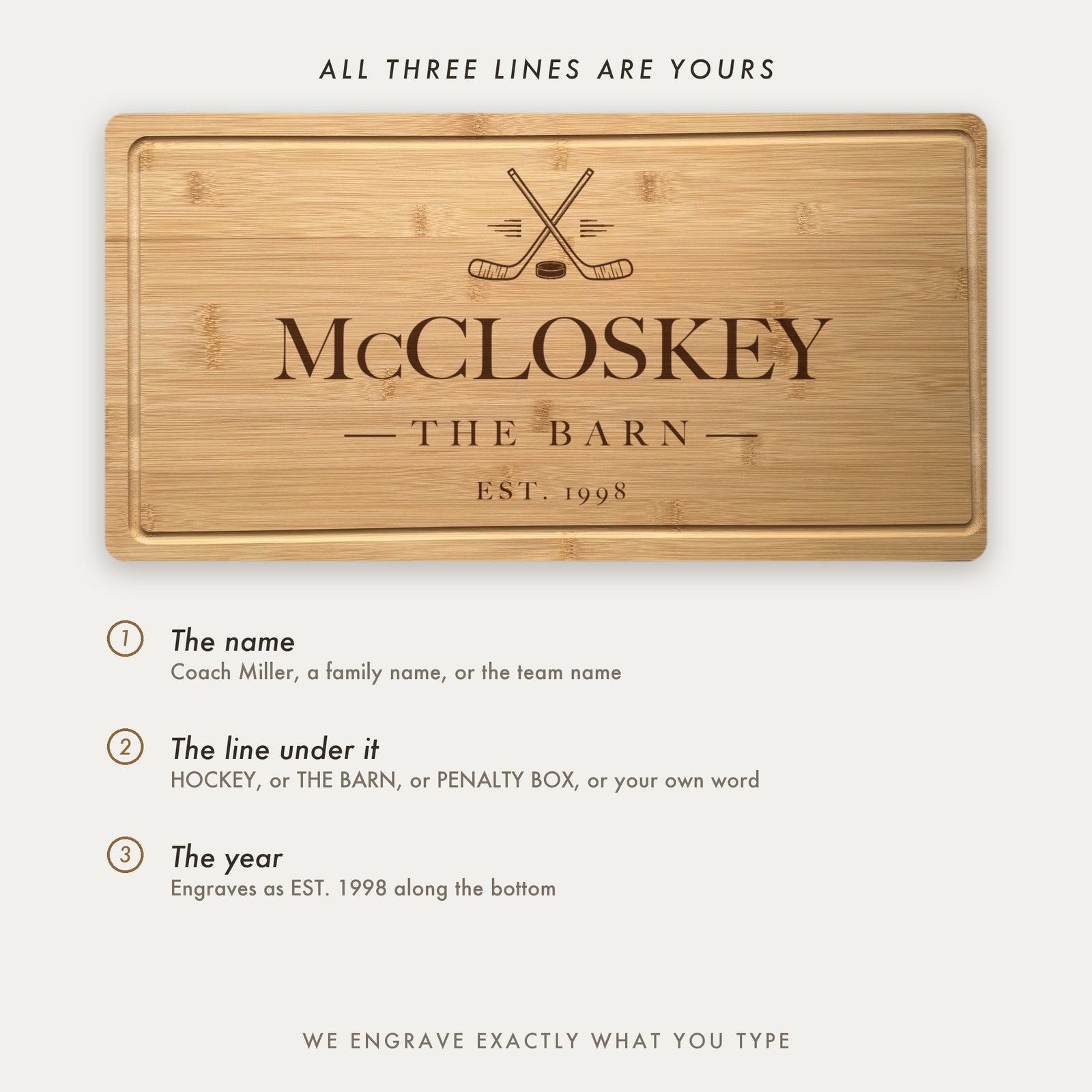 How the hockey board is personalized, shown as McCloskey The Barn with all three lines set by the customer including the line under the name.