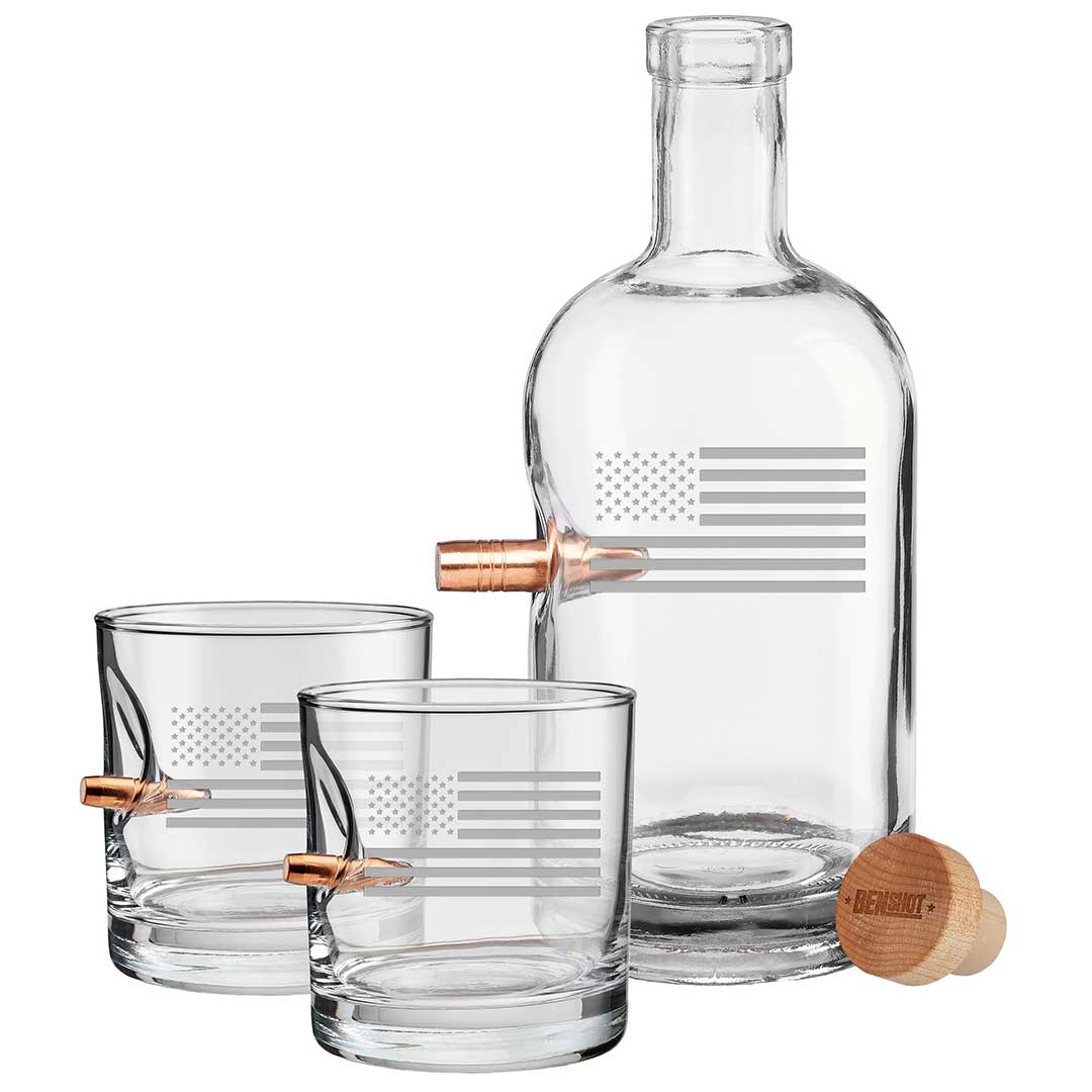 Whiskey decanter with .50 BMG bullet and two rocks glasses with .308 bullets and etched American flags