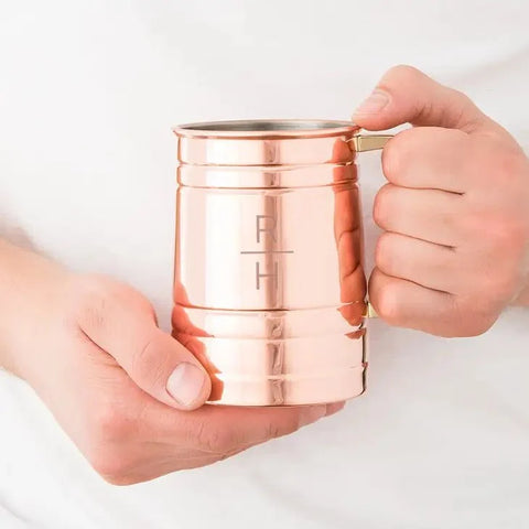 Personalized copper Moscow mule stein engraved with a monogram, the traditional bronze-family metal for an 8th wedding anniversary gift for him
