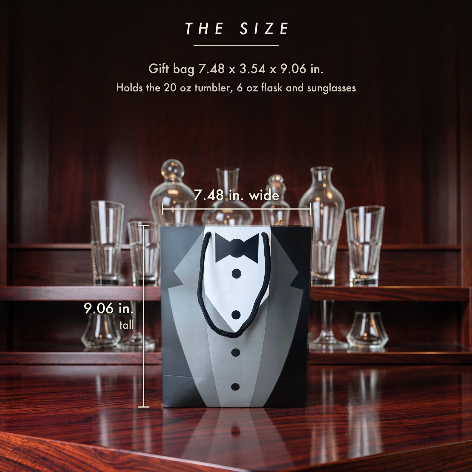 Size of the tuxedo groomsmen gift bag, 7.48 inches wide and 9.06 inches tall, which holds the tumbler, flask and sunglasses