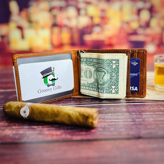 QuickFold leather wallet open on a bar top, a clear ID window on the left and folded bills held by the money clip beside a card slot on the right