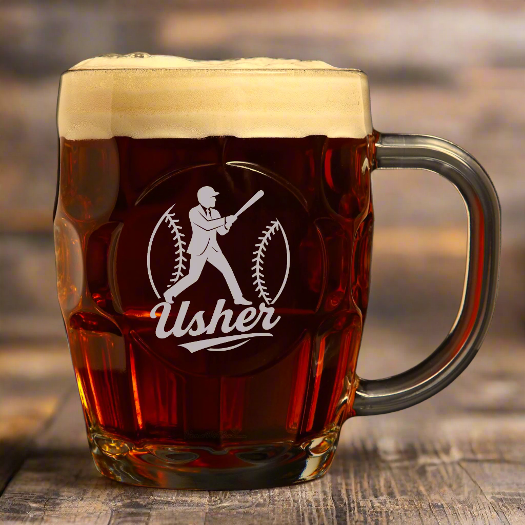 Glass mug filled with beer, featuring a &#39;Usher&#39; logo on a white background