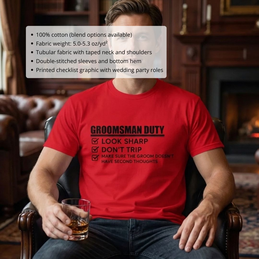 Man wearing bright red t-shirt with black printed checklist reading "Groomsman Duty" with checked boxes for look sharp, don't trip, and make sure groom doesn't have second thoughts