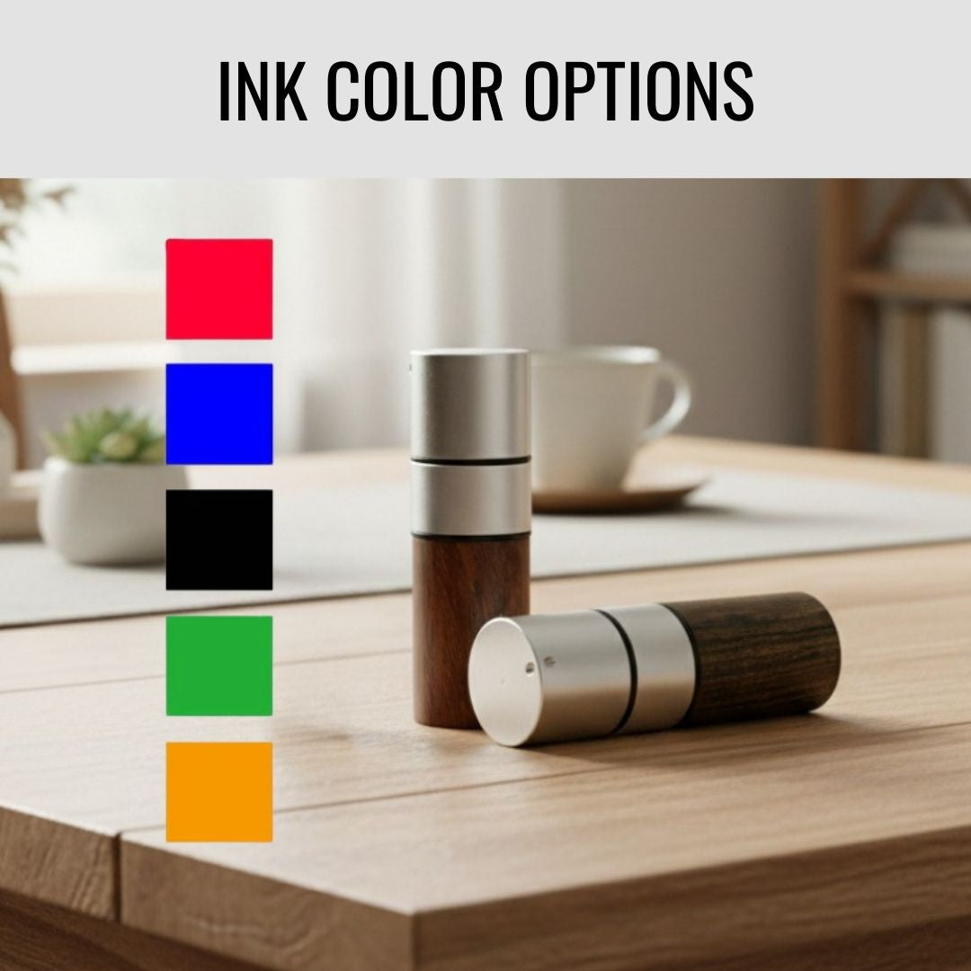 Ink color options displayed as five colored swatches—red, blue, black, green, and orange—shown alongside wooden golf ball stamps with stainless steel and wood construction