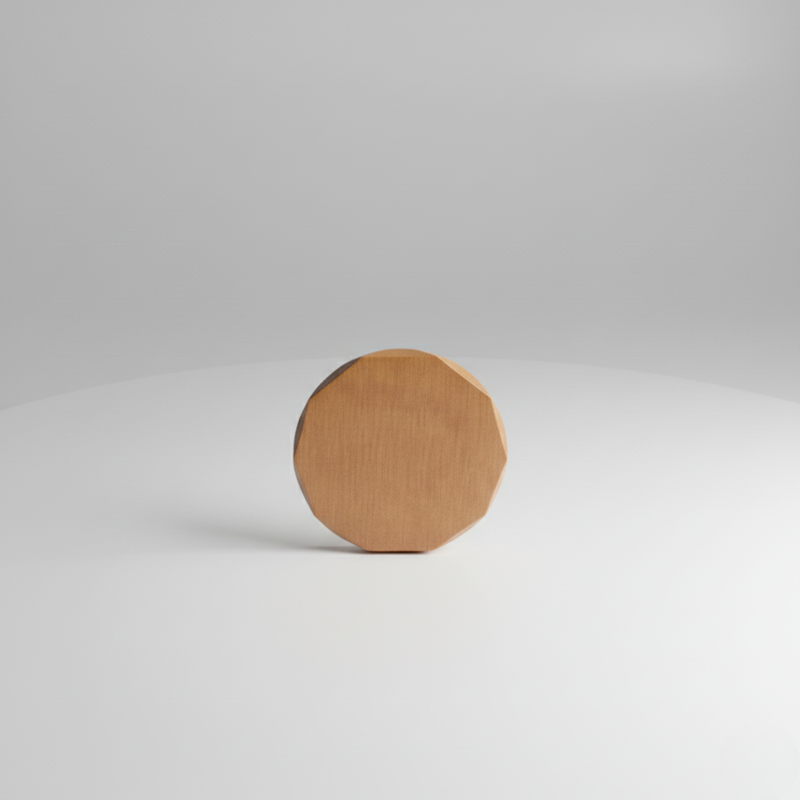 Wooden ball marker with brushed surface finish, shown against neutral background