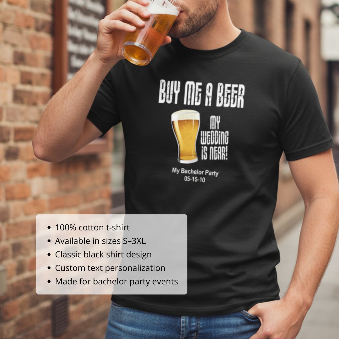 Man wearing black cotton t-shirt printed with "Buy Me a Beer My Wedding is Here" text, beer glass graphic, and sample date "My Bachelor Party 05-15-10