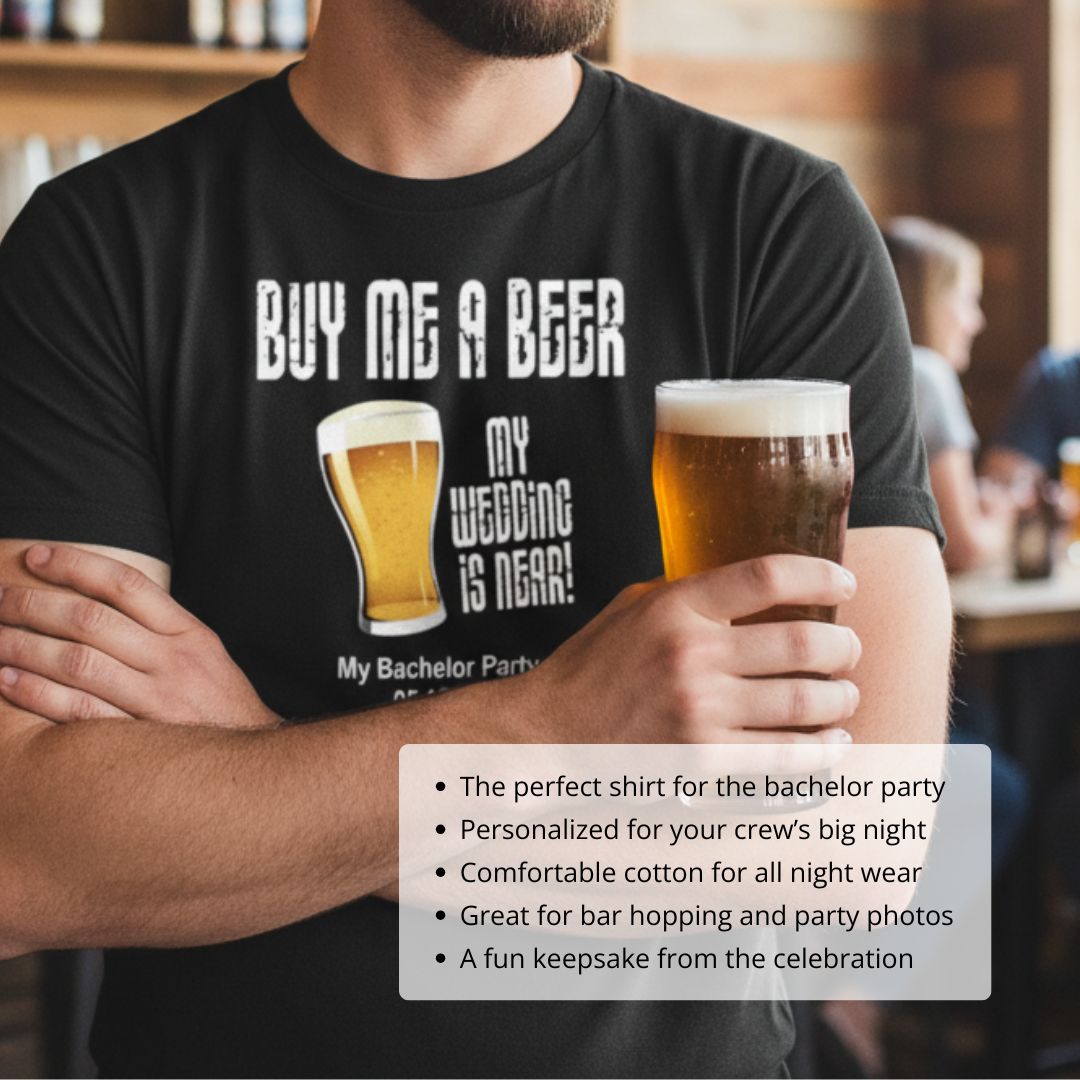 Black t-shirt with "Buy Me a Beer My Wedding is Near" text and beer glass graphics, worn in a bar setting with sample personalization