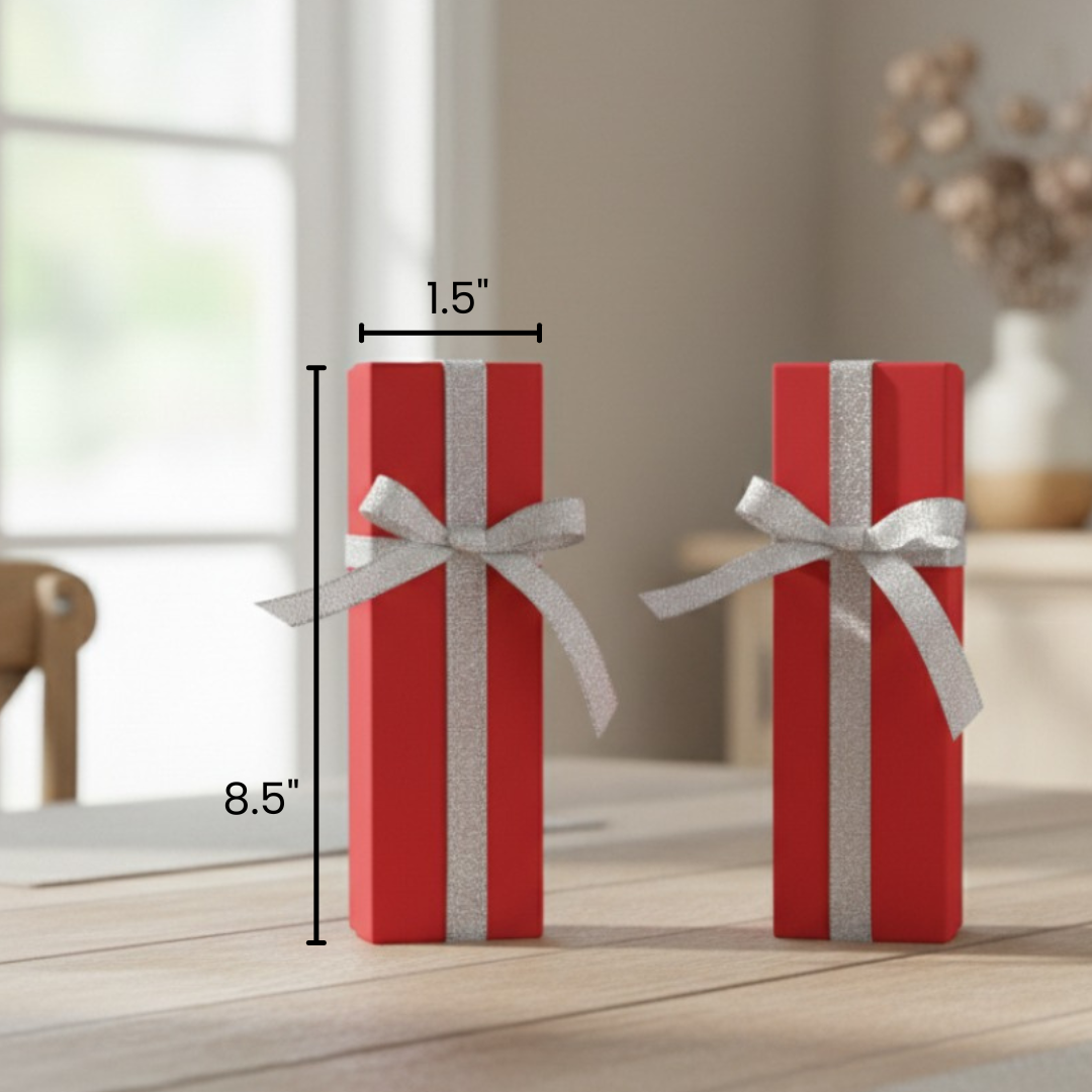 Two red gift boxes with gray ribbon bows, dimensions marked at 1.5 inches wide by 8.5 inches tall, displayed on wooden surface.