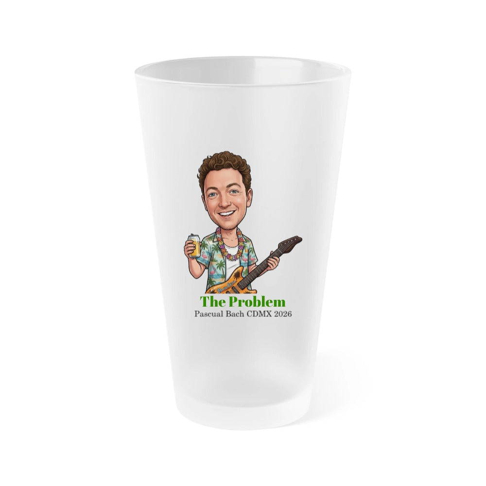 Frosted pint glass printed with sample caricature of man holding beer and guitar, labeled "The Problem Pascual Bach CDMX 2026