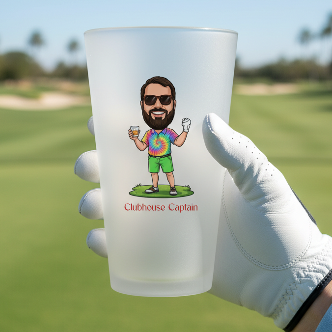 Frosted glass cup with a character design held by a gloved hand on a golf course.