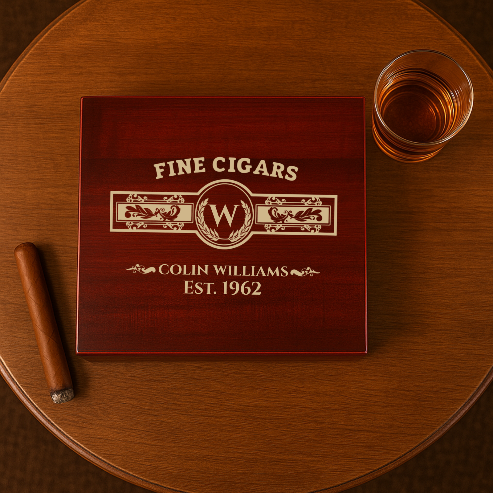 Wooden cigar humidor with 'Fine Cigars' branding on a wooden table with a glass of whiskey.