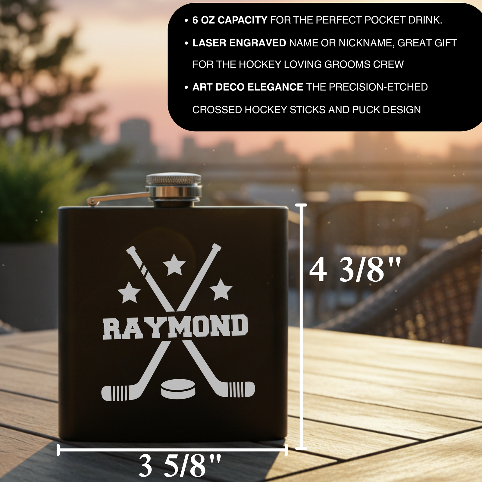 Black matte flask with laser-engraved hockey design featuring crossed sticks, puck, and stars with sample name "RAYMOND" positioned on outdoor wooden table