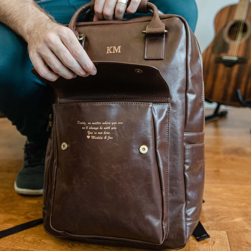 Brown vegan leather laptop backpack with custom name engraving and front flap pocket