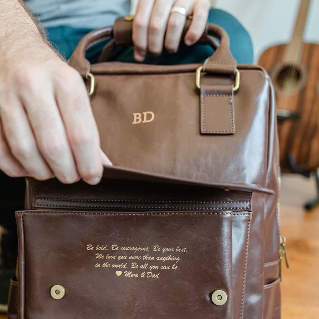 Brown vegan leather laptop backpack with custom name engraving and front flap pocket