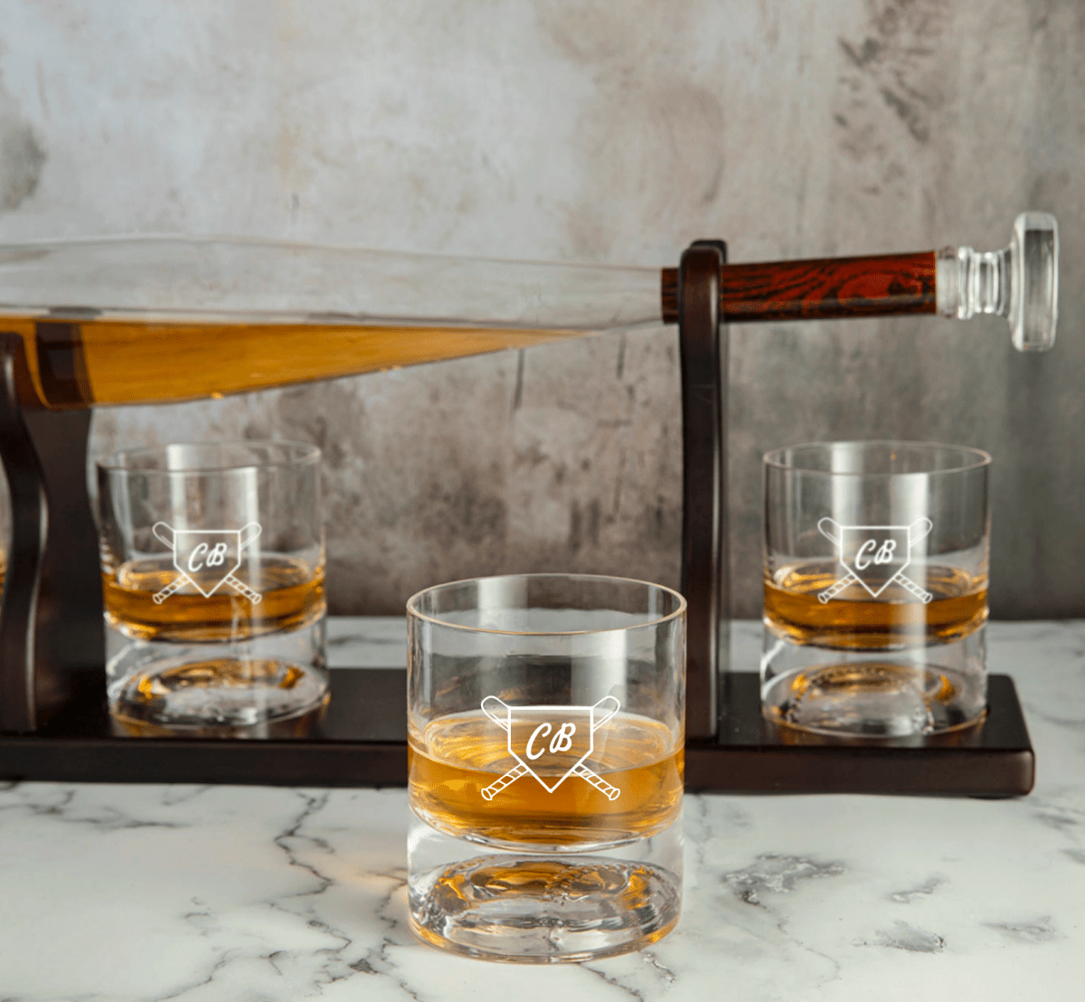 Baseball bat-shaped whiskey decanter set with matching glasses and mahogany holder