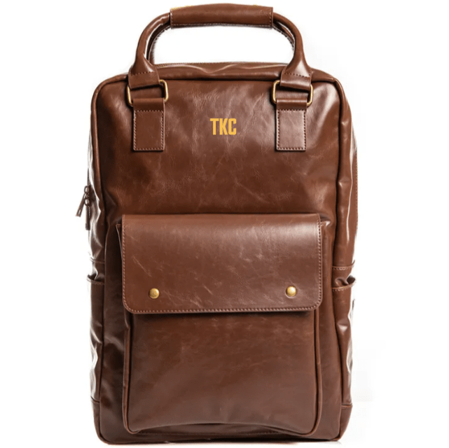 Brown vegan leather laptop backpack with custom name engraving and front flap pocket