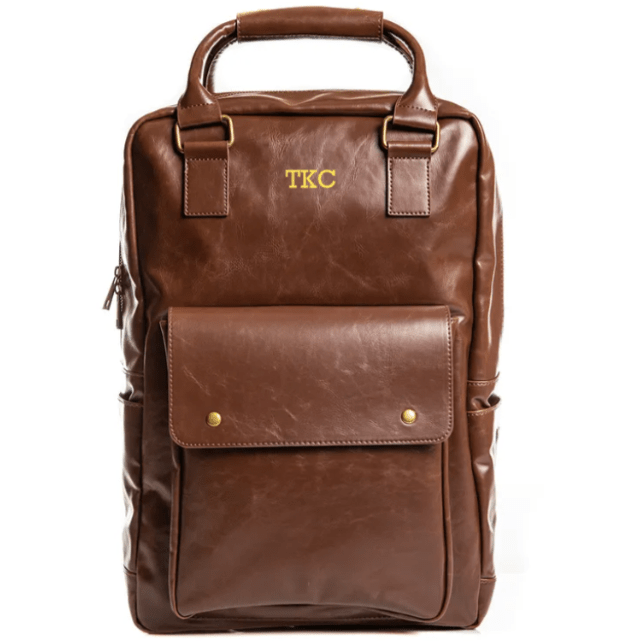 Brown vegan leather laptop backpack with custom name engraving and front flap pocket