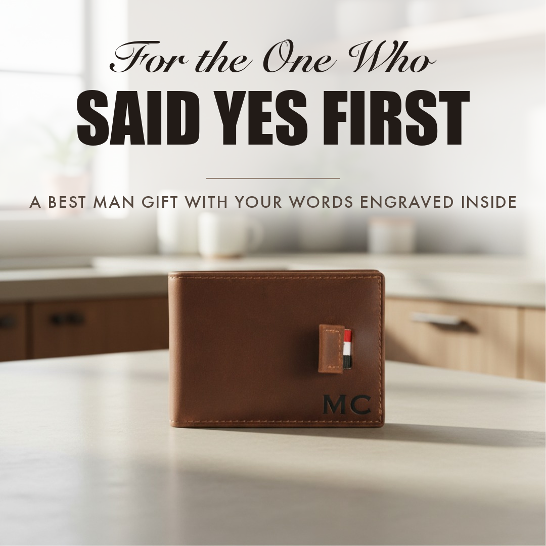 Brown leather bifold wallet engraved with initials, captioned For the One Who Said Yes First, shown as a best man gift.