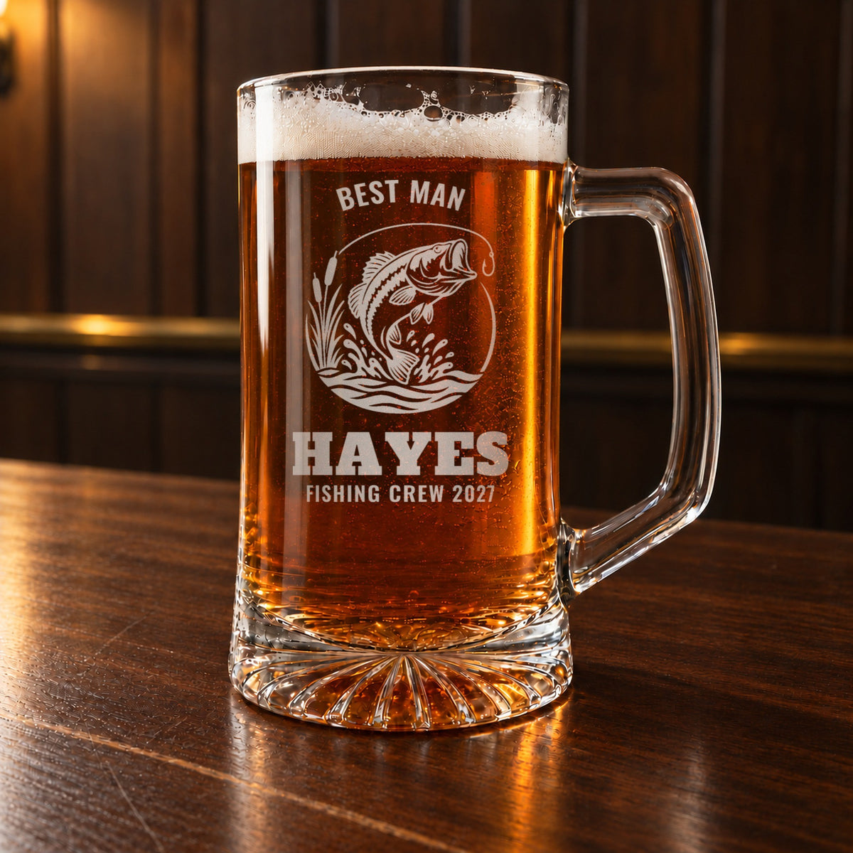 Personalized fishing beer stein on a walnut bar, engraved with a leaping largemouth bass: Best Man, Hayes, Fishing Crew 2027