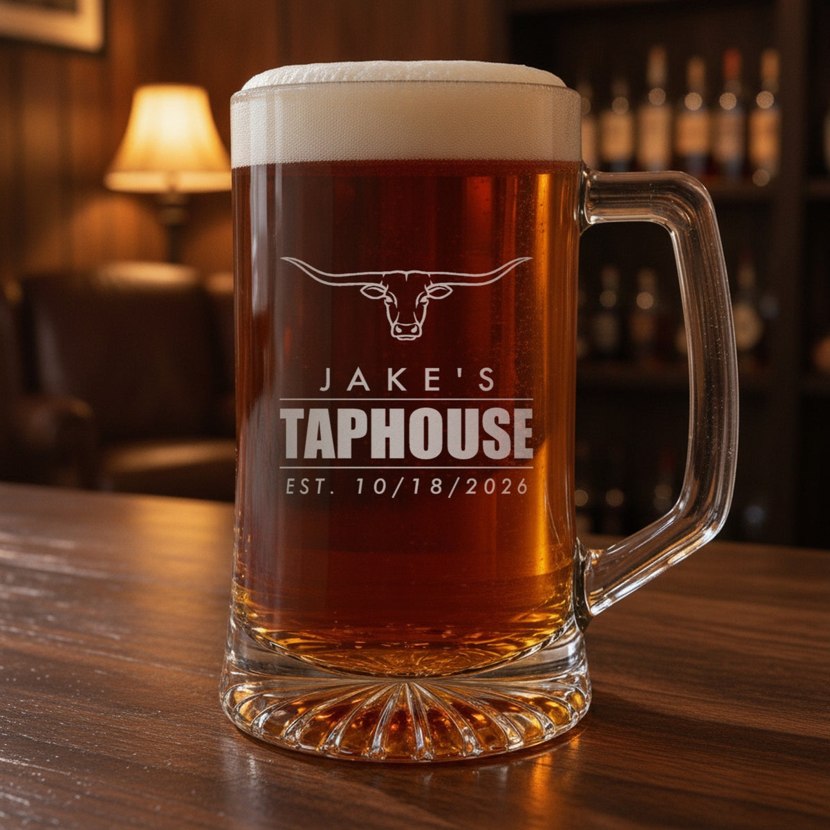 Engraved beer stein for the groom from his bride on a home bar, a longhorn over Jake's Taphouse and Est. 10/18/2026