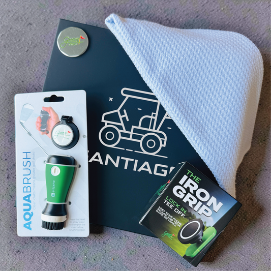 Groomsman golf gift box featuring a name-engraved keepsake box, club cleaner, waffle microfiber towel, ball marker and magnetic phone mount.