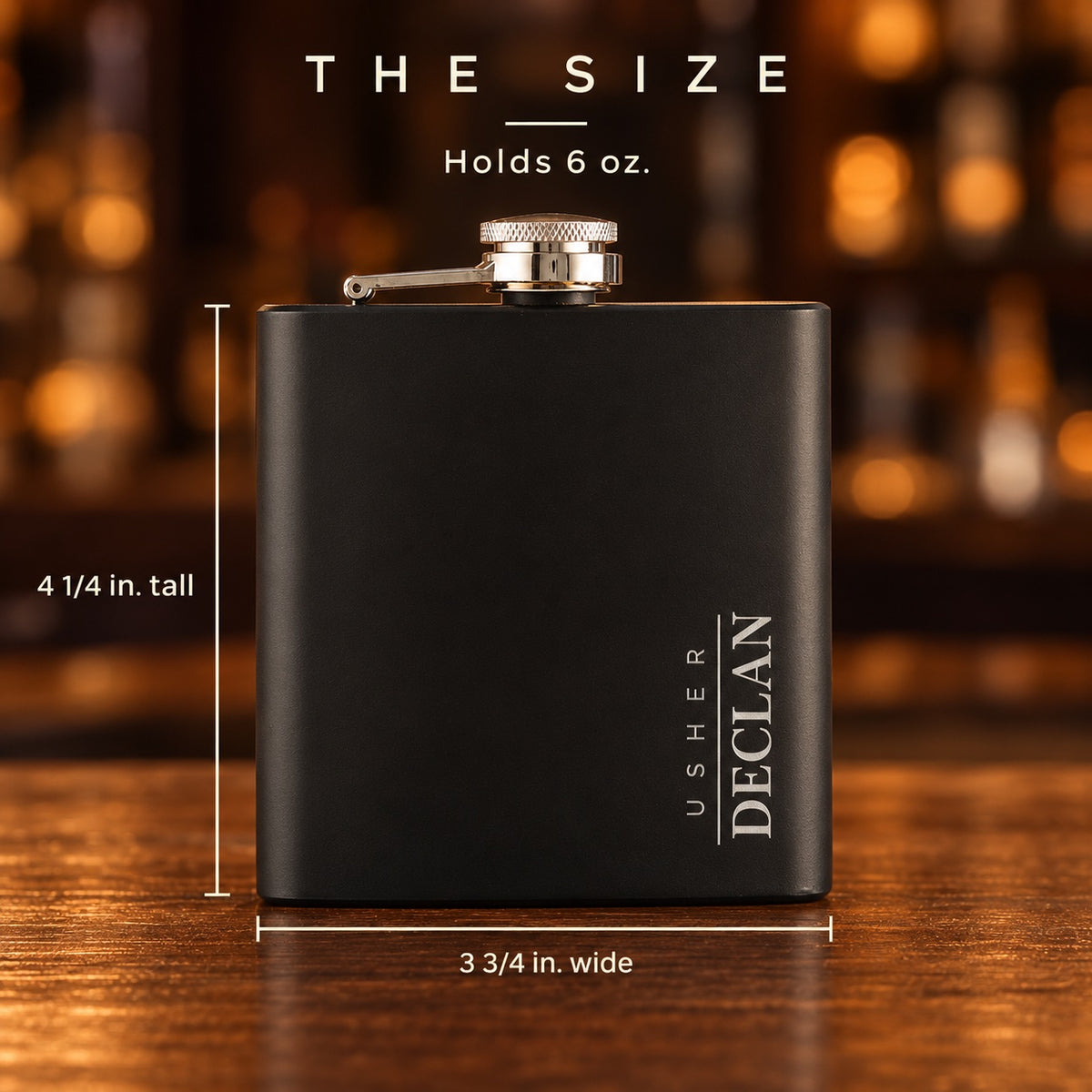Size of the engraved groomsmen flask with dimension lines, 4 1/4 inches tall and 3 3/4 inches wide, holds 6 oz, engraved USHER and DECLAN down the side