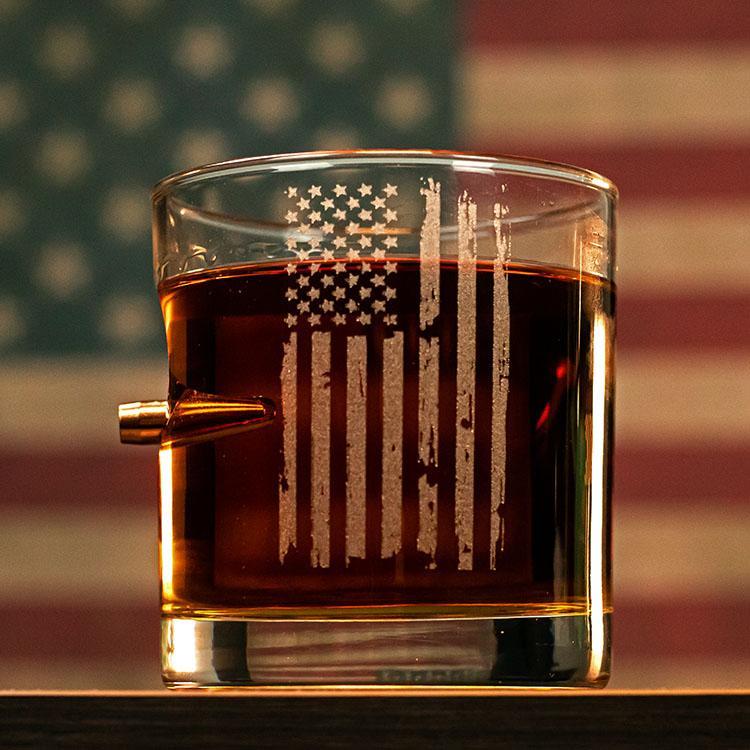 Whiskey rocks glass with embedded .308 bullet and laser-etched American flag design