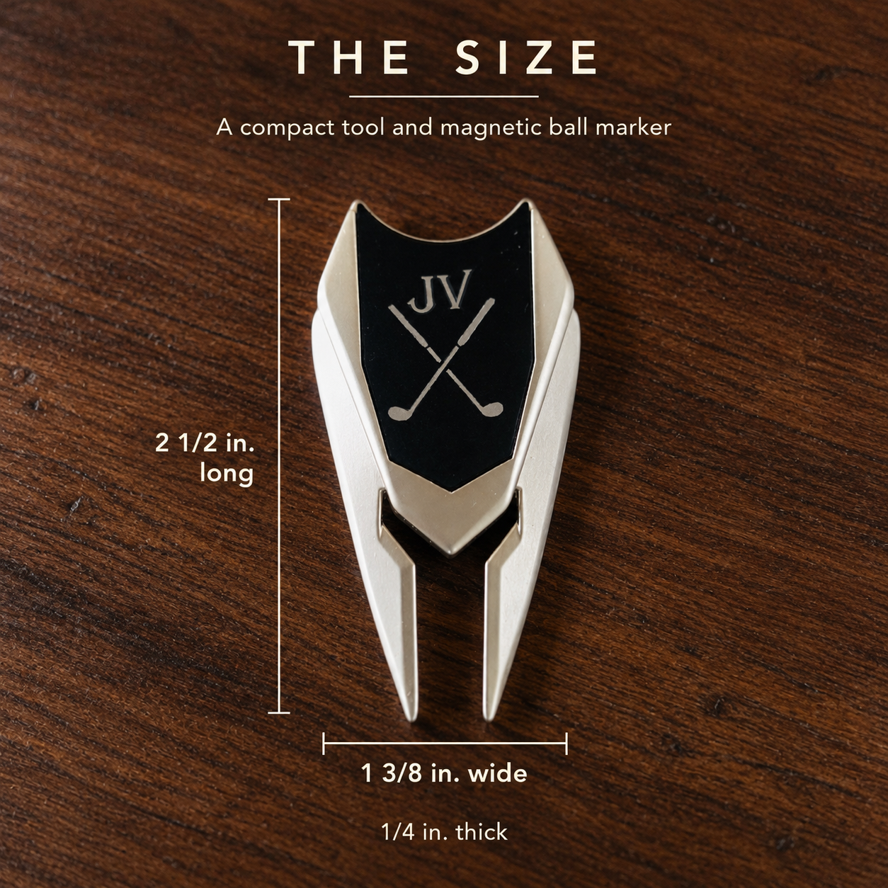 Size of the personalized golf divot tool: 2 1/2 inches long and 1 3/8 inches wide, with the engraved JV ball marker in place
