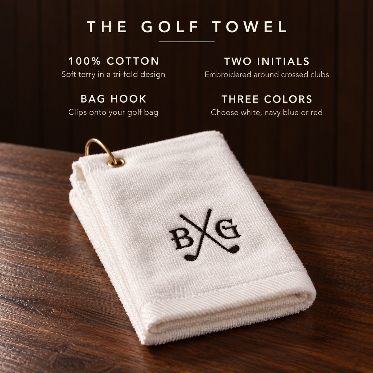 Details of the personalized golf towel: 100 percent cotton tri-fold, two initials embroidered around crossed clubs, a bag hook, three colors