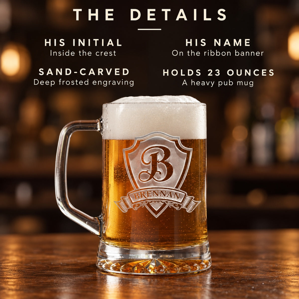 Details of the personalized groomsmen beer mug: his initial inside the crest, his name on the ribbon banner, deep sand-carved frosting and a 23 ounce heavy mug.
