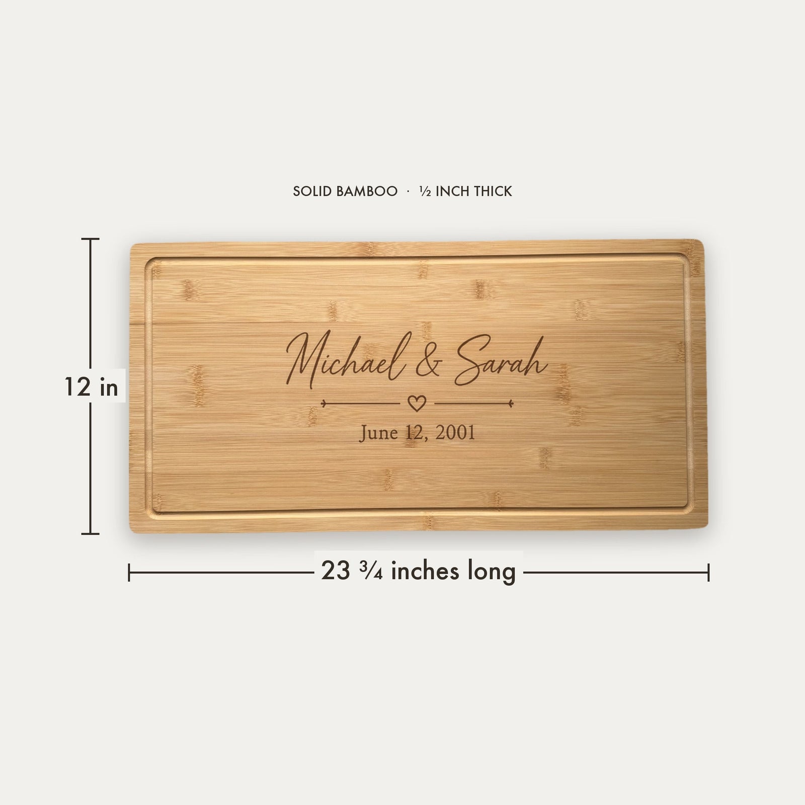 Size guide for the personalized wedding charcuterie board, 23 and three quarter inches long by 12 inches wide in half inch thick solid bamboo.
