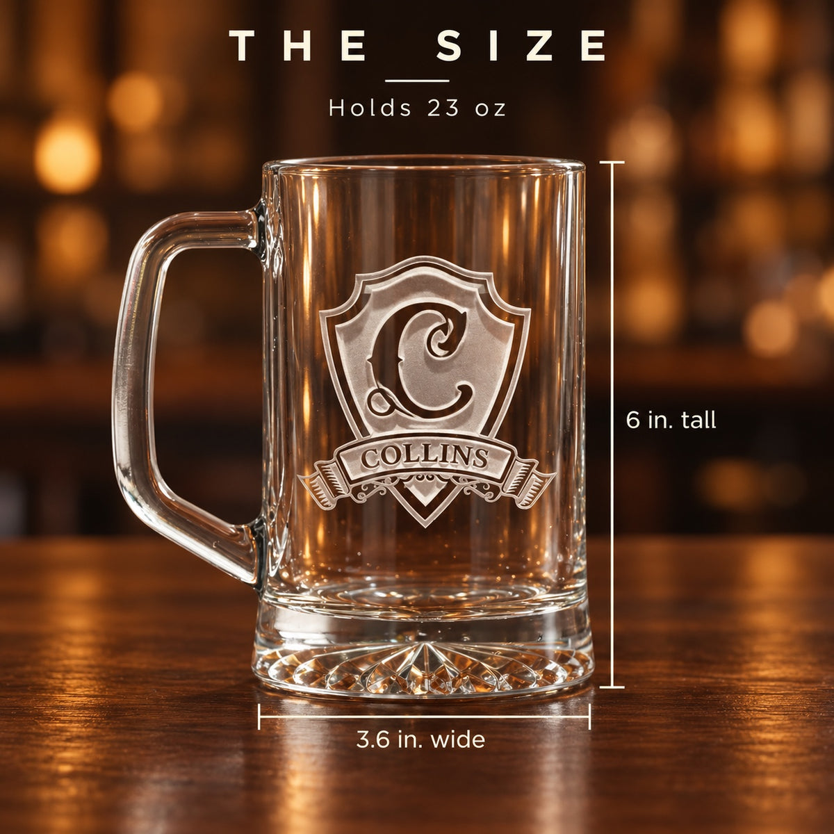 Size of the personalized pub beer mug: 6 inches tall and 3.6 inches wide, holds 23 oz, sand-carved with a C crest and COLLINS on the banner.
