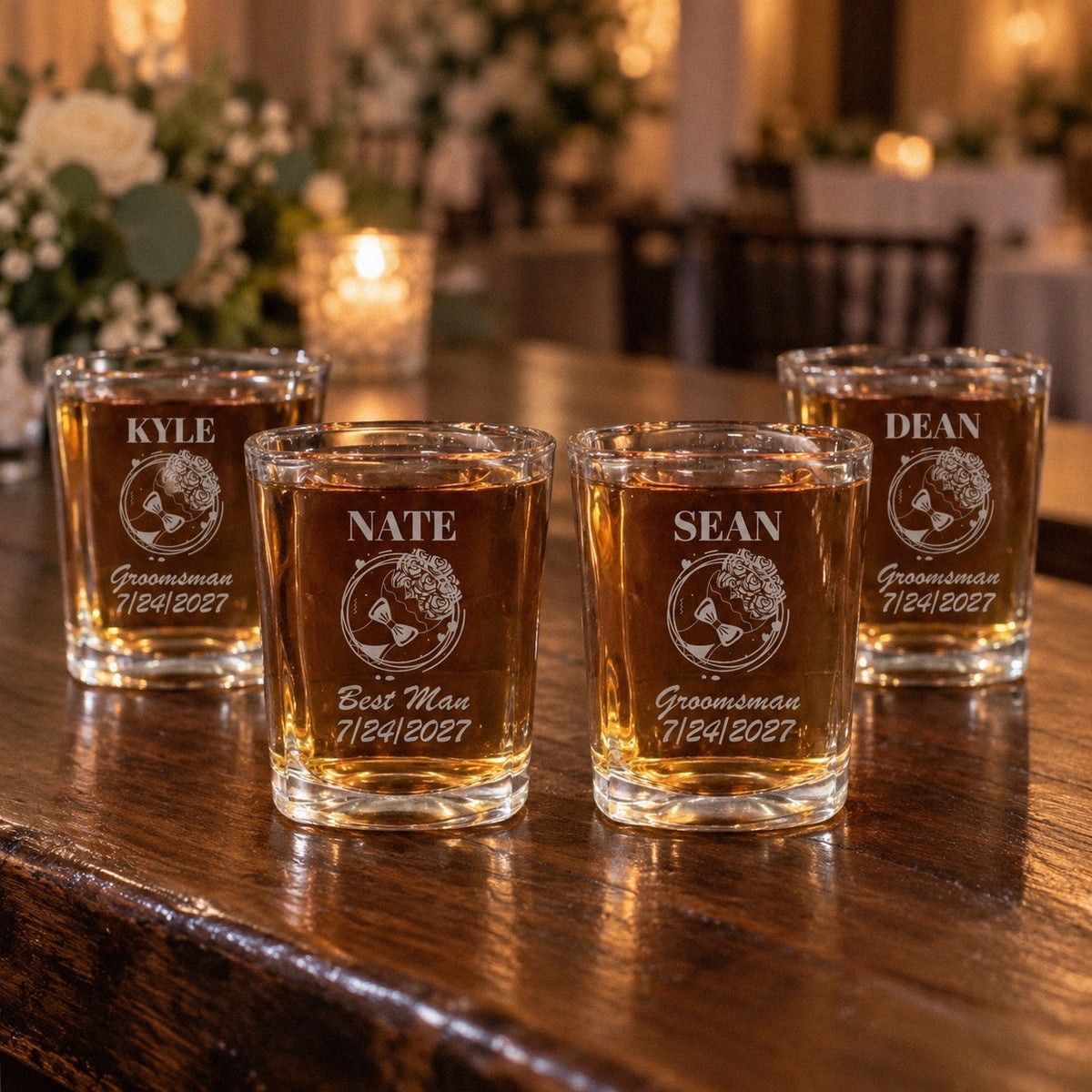 Four groomsmen shot glasses on a bar, each with the floral crest and bow tie design: NATE as Best Man, with SEAN, KYLE and DEAN as Groomsman