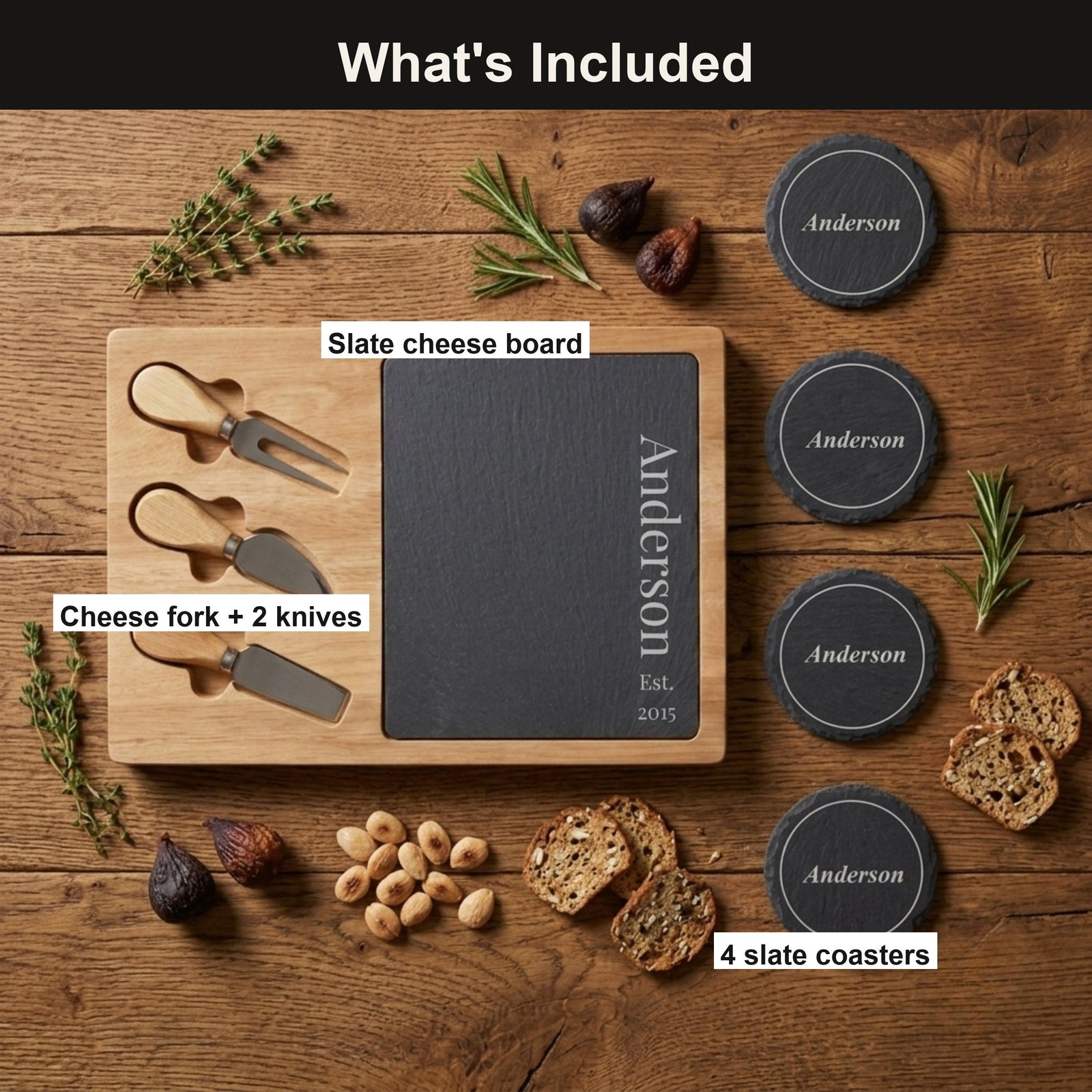 Everything included in the personalized slate cheese board set: acacia board with slate insert, a cheese fork and two knives, and four Anderson slate coasters