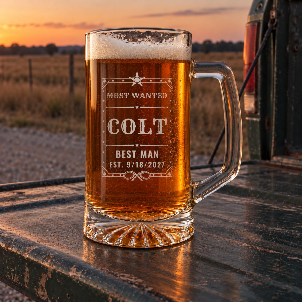 Personalized wanted poster beer stein in a real setting, engraved with an Old West wanted poster with a sheriff star and lassos: Most Wanted, Colt, Best Man, Est. 9/18/2027