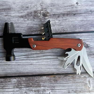 Open multi tool against wood background ?id=27967142035541